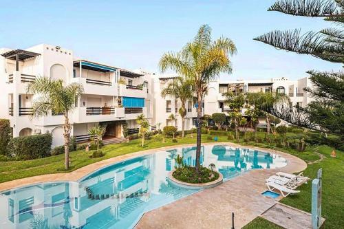 MOU - Appartement moderne 2 chambres avec piscine a Skhirat Plage in Skhirat