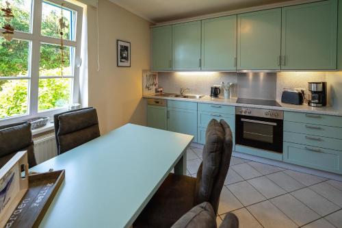 Reethaus Zickersche Berge - WG 02 mit Kamin und Terrasse - image 4