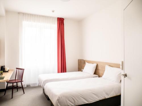 Chambre avec 2 lits