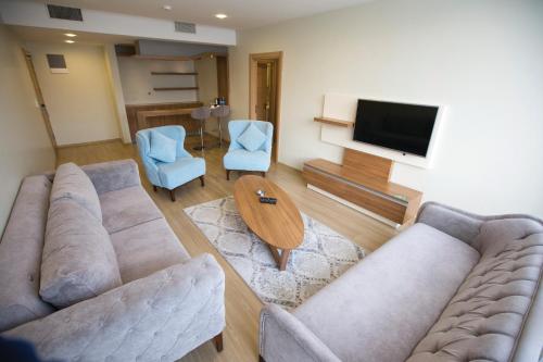 Alesha Suite Otel Room Type - Apartment with Sofa Bed and City View