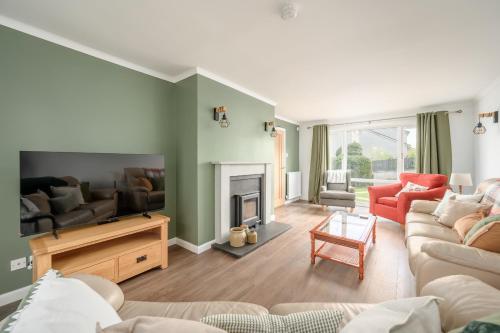 Közös társalgó / TV, King Brude 5 Bedroom House - Inverness in Scorguie