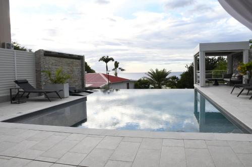 Piscina, Bungalow Plaisir Exotique - Plaisir d Évasion (Bungalow Plaisir Exotique - Plaisir d Evasion) in Deshaies