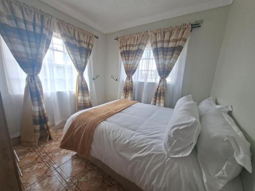 ทัศนียภาพภายนอกโรงแรม, Home away from home in Sunway City, opposite Zimre Park Ruwa in รูวา