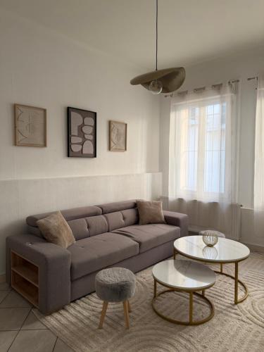 Appartement centre-ville avec patio et climatisation