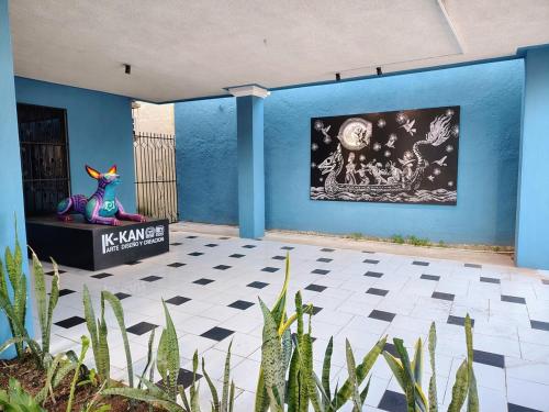 Calli Tochtli Dreaming Among Alebrijes in Sta Lucia