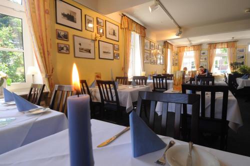 Restaurang, Hotel Pension Am Hafen in Norden