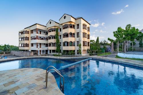 Hewani a bright & airy 1 BR apartment with an ocean view & pool in 基利菲
