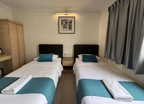 Wangsa Village Inn Room Type - Deluxe Twin No Window