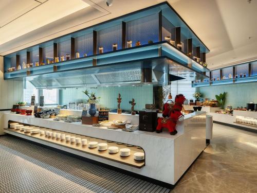 Ресторан, Novotel Dalian Zhongshan Square in Далянь