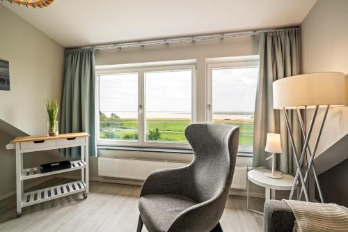 5- Sterne Ferienwohnung Dünenrast mit Blick über den Saaler Bodden in Wustrow, Deutschland
