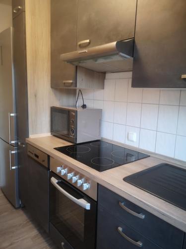 Modernes 2-Zimmer-Apartment mit Balkon & Gartenblick