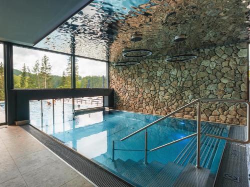 TRIFORET alpin resort by Falkensteiner in Hinterstoder, Österreich