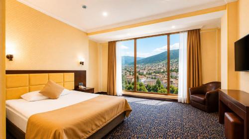 Koplietošanas atpūtas telpa ar TV, Ruma Qala Hotel in Šeki