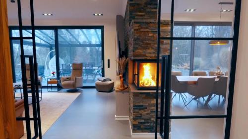 Villa with outdoor heated pool, sauna and fireplace