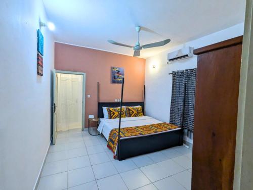 Letto, Petit Cocon de Ouidah - Chambre Cosy Climatisée - Plage a 10 min - Salon, Cuisine et balcon (Petit Cocon de Ouidah - Chambre Cosy Climatisee - Plage a 10 min - Salon, Cuisine et balcon) in Ouidah