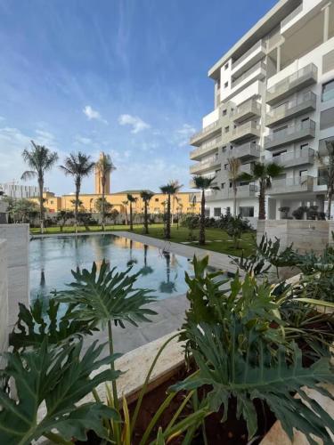 Swimming pool, Luxe Apartment in Casa Finance District - Pool - Open view - Fast WIFI in Cil