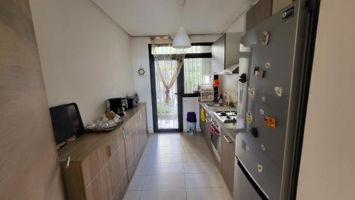 주방, Appartement Plage des Nations Prestigia Front Mer avec grand Jardin in 시디 부크나델