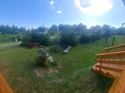 Całoroczny domek nad jeziorem Raduńskim (Caloroczny domek nad jeziorem Radunskim) in Złota Góra