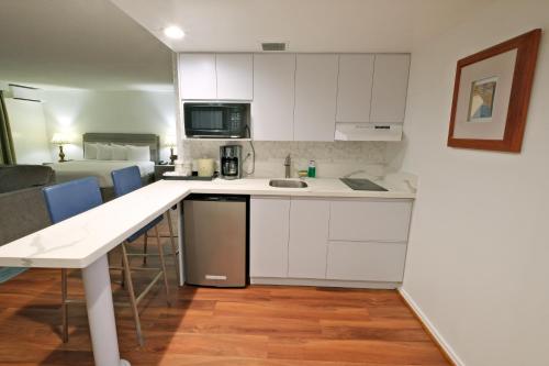 Kitchen, Ramada Plaza by Wyndham Waikiki near Cafe Laniakea