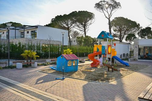Детская площадка, Cozy Apartment in San Pietro Resort - Happy Rentals in Плазай-Сан-Пиетро