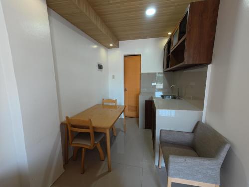 Kitchen, TravelNest Transient Inn Santa Rosa Laguna in Santa Rosa