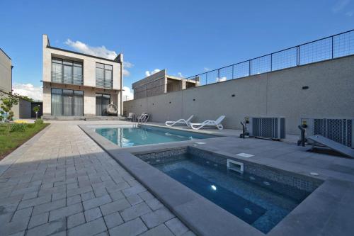 Modern Villa with Private Pool & Garden by Domel in Abovyan