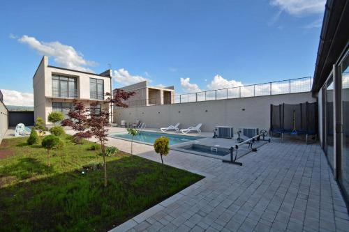 Modern Villa with Private Pool & Garden by Domel in Abovyan