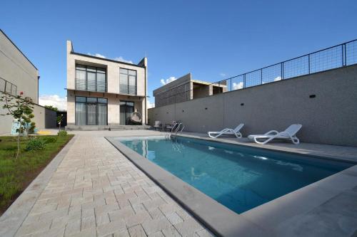 Modern Villa with Private Pool & Garden by Domel in Abovyan