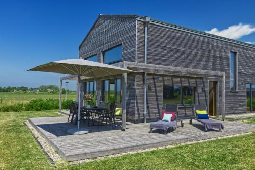 Gud Jard Chalet Nr 07 - Design-Ferienhaus mit exklusiver Ausstattung in Pellworm, Deutschland