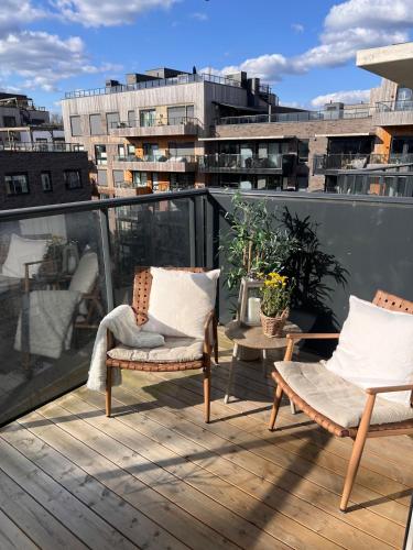 Bright, stylish apartment with a sunny balcony close to nature in Sogn