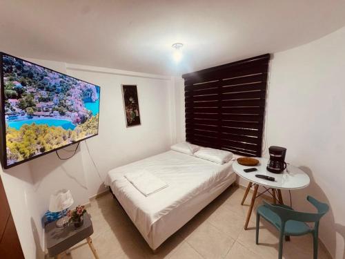 Habitación Queen Confort con Smart TV, cafetera y Wifi, Galán Deluxe