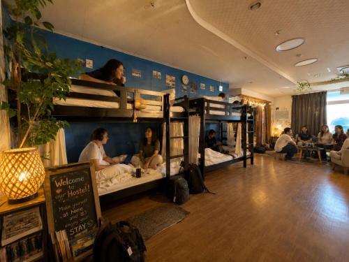 ハイ沖縄金武店トイレお風呂共用 プレオープン中駐車場有 ペット同伴可能長期滞在可能2025年10月より車貸し出しサービス有希望であればお申し付けください in Kin