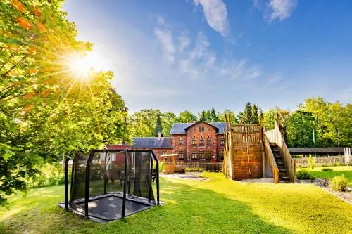 Ferienhaus Bimmelbahn 2 - Familienferienhaus 100 m am Dampflokbahnhof Sauna Trampolin Spielezimmer in Olbersdorf, Deutschland