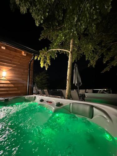 Karsto avotu baseins, Boga Chalet in Bogë