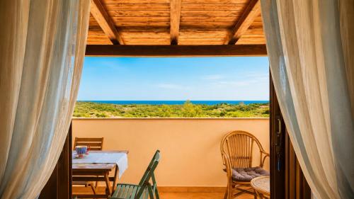 S'Arborinu Apartment with terrace overlooking the sea