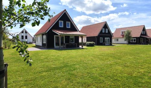 Exterior view, Villapark Wulpdal | Villa De Zeehond in Verspreide huizen Scherpenisse