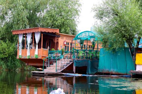 Green view group of houseboats in Srinagar