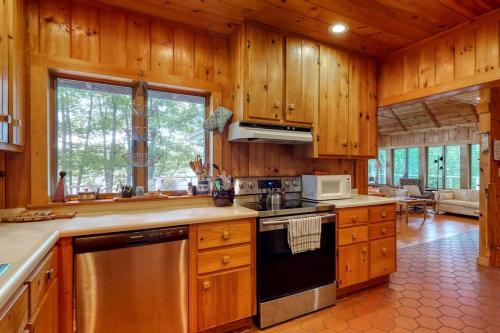 Private waterfront home with large deck & deep water dock