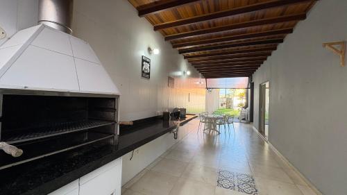 Kitchen, Kaliman Pousada in Praia do Sape