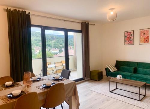Appartement avec 2 chambres et séjour balcon plein sud et une vue panoramique 180 a GERARDMER app 103
