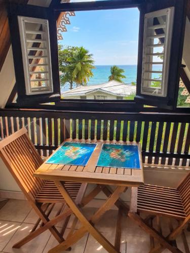 Studio confortable vue jardin au Diamant, 25 m² in เลอ ยามัน