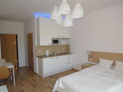 Studio (2 Adults + 1 Child) room in Apartamenty Karawela - Nadmorski Dwór