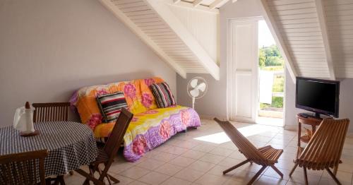 Quarto de hóspedes, Appartement confortable à Capesterre, 40 m², jardin agréable (Appartement confortable a Capesterre, 40 m², jardin agreable) in Capesterre-de-Marie-Galante