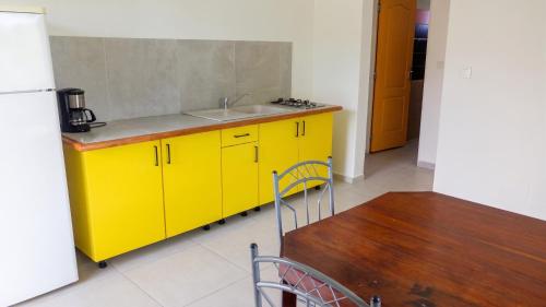 Cozinha, Appartement confortable à Capesterre, 40 m², jardin agréable (Appartement confortable a Capesterre, 40 m², jardin agreable) in Capesterre-de-Marie-Galante