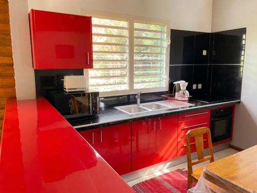 ห้องครัว, Appartement spacieux à Sainte-Rose, 70 m² avec jardin (Appartement spacieux a Sainte-Rose, 70 m² avec jardin) in ซานต์ โรเซ