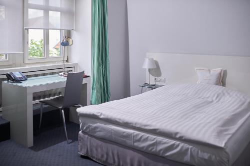 RomanticHOTEL Goldener Karpfen - das kleine, feine Grandhotel direkt in der Altstadt – Fulda, AL