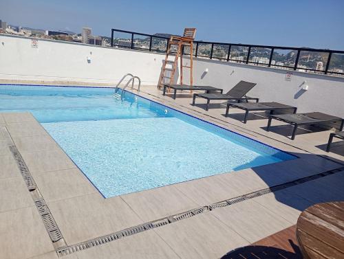 Swimming pool, Modern Apartment with Pool and Parking in Rio de Janeiro in Sao Francisco Xavier