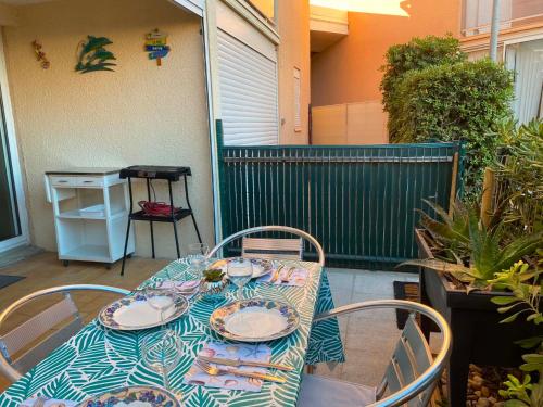 Bord de plage, secteur Lydia, rdc, terrasse, très joli appt 4 couchages, ventilateur plafond