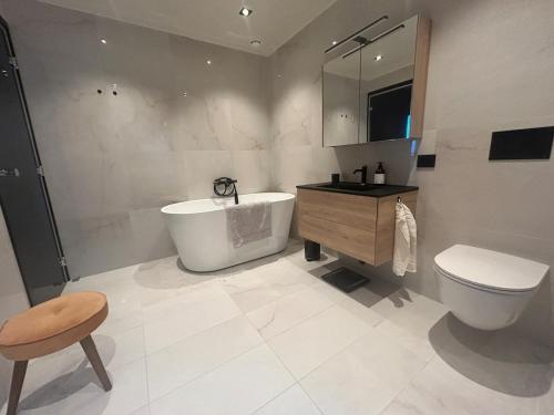 House with pool and steam bath on the beach! in Borhaug