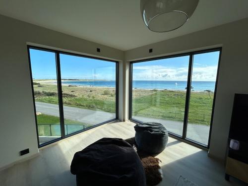 House with pool and steam bath on the beach! in Borhaug